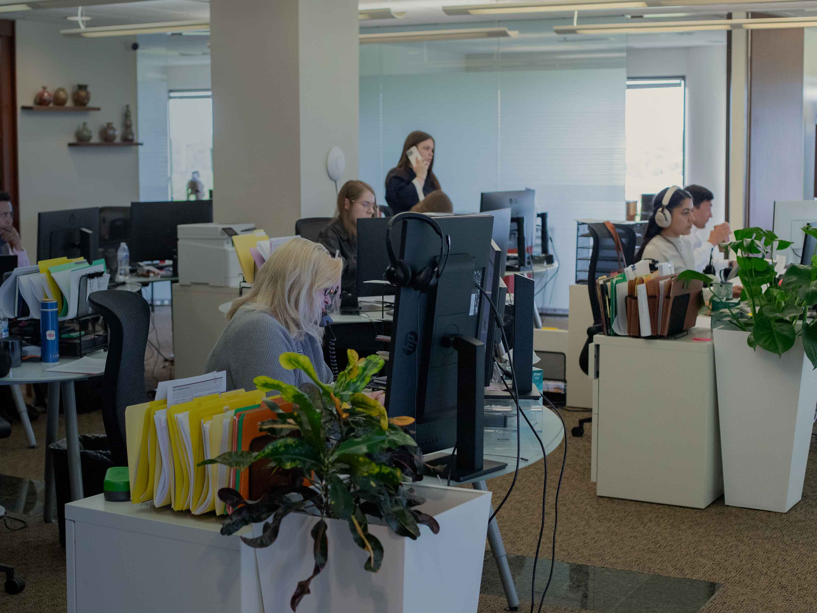 The open-plan BIRG Law office with attorneys and support staff working at their desks